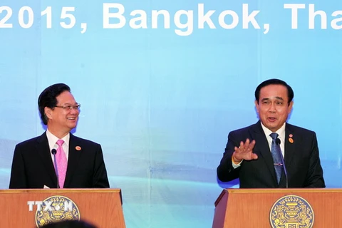 Thủ tướng Nguyễn Tấn Dũng và Thủ tướng Thái Lan Prayuth Chan-ocha họp báo chung. (Ảnh: Đức Tám/TTXVN)