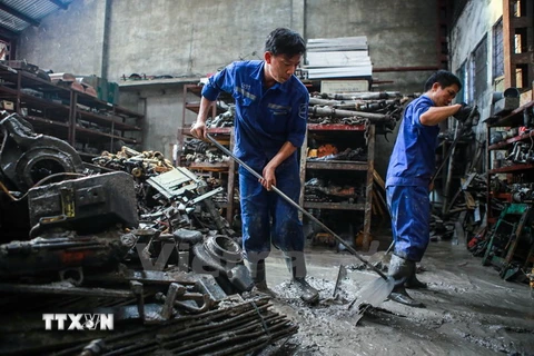 Một tuần nữa, khoảng 4.000 công nhân ở mỏ Mông Dương sẽ được nghỉ việc, có nguy cơ bị chuyển sang chỗ làm khác. (Ảnh: Minh Sơn/Vietnam+)