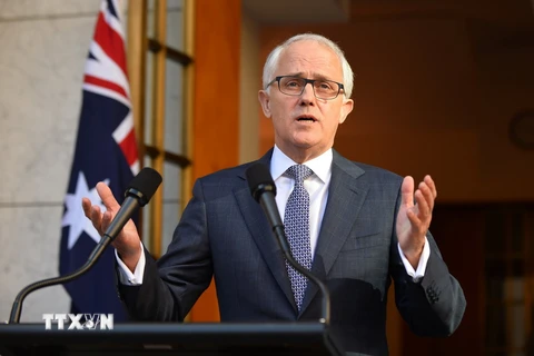 Thủ tướng Australia Malcolm Turnbull trả lời báo giới sau khi công bố nội các mới ở thủ đô Canberra ngày 20/9. (Ảnh: AFP/TTXVN)