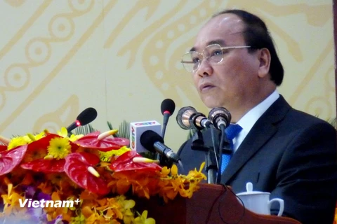 Ông Nguyễn Xuân Phúc, Ủy viên Bộ chính trị, Phó Thủ tướng Chính phủ phát biểu tại Đại hội. (Ảnh: Hi Trang-Đức Thọ/Vietnam+)