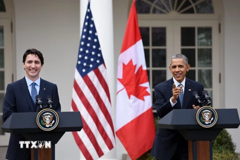 Tổng thống Mỹ Barack Obama (phải) và Thủ tướng Canada Justin Trudeau tại cuộc họp báo sau hội đàm. (Ảnh: THX/TTXVN)