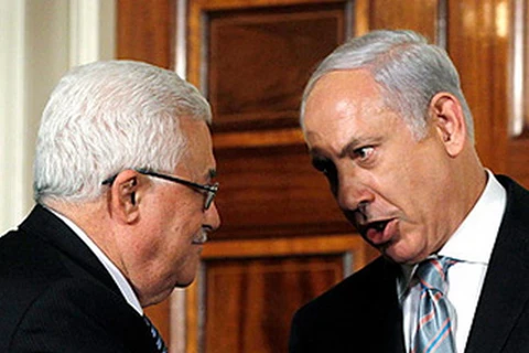 Tổng thống Palestine Mahmoud Abbas và Thủ tướng Israel Benjamin Netanyahu. (Nguồn: Reuters)