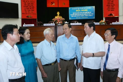 Chủ tịch nước Trần Đại Quang tiếp xúc cử tri quận 3. (Ảnh: Nhan Sáng/TTXVN)