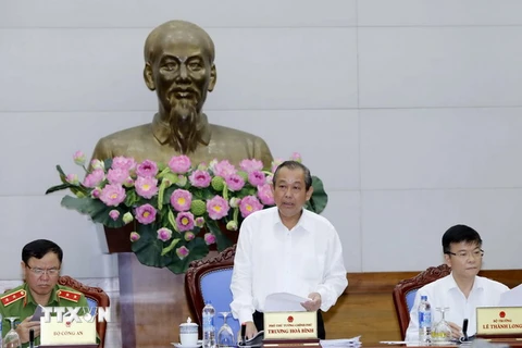 Phó Thủ tướng Trương Hòa Bình phát biểu tại cuộc họp. (Ảnh: An Đăng/TTXVN)
