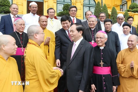 Chủ tịch nước Trần Đại Quang với các đại biểu. (Ảnh: Nhan Sáng/TTXVN)