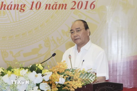 Thủ tướng Nguyễn Xuân Phúc phát biểu kết luận hội nghị. (Ảnh: Phạm Kiên/TTXVN)