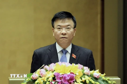 Bộ trưởng Tư pháp Lê Thành Long phát biểu ý kiến. (Ảnh: Phạm Kiên/TTXVN) 