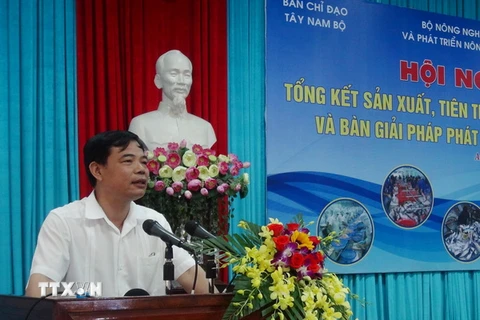 Bộ Trưởng Bộ Nông nghiệp và Phát triển Nông thôn Nguyễn Xuân Cường phát biểu tại hội nghị. (Ảnh: Công Mạo/TTXVN)