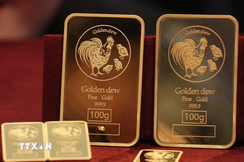 Vàng miếng được bày tại cửa hàng Lotte ở Seoul, Hàn Quốc. (ẢNh: YONHAP/TTXVN)
