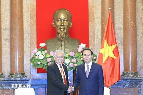 Chủ tịch nước Trần Đại Quang tiếp Bộ trưởng Bộ Thương mại Cộng hòa Indonesia Enggartiasto Lukita nhân chuyến thăm và làm việc tại Việt Nam. (Ảnh: Nhan Sáng/TTXVN)