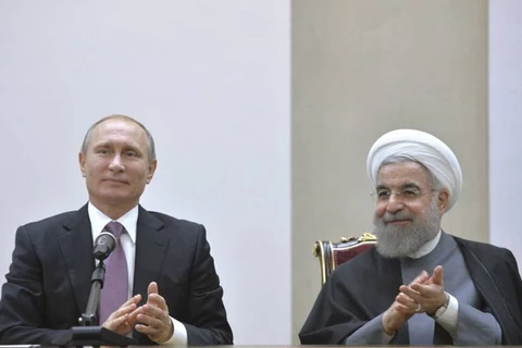 Tổng thống Iran Rouhani đã có cuộc điện đàm với người đồng cấp Nga Putin. (Nguồn: Reuters)