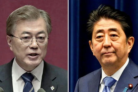 Tổng thống nước này Moon Jae-in và Thủ tướng Nhật Bản Shinzo Abe. (Nguồn: Reuters)