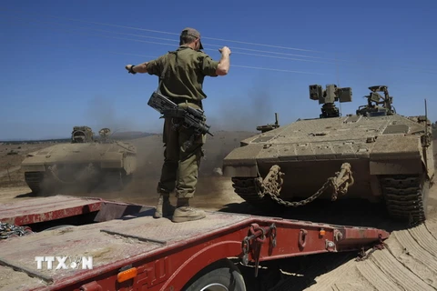  Binh sỹ Israel tại khu vực Cao nguyên Golan ngày 7/9. (Ảnh: AFP/TTXVN)