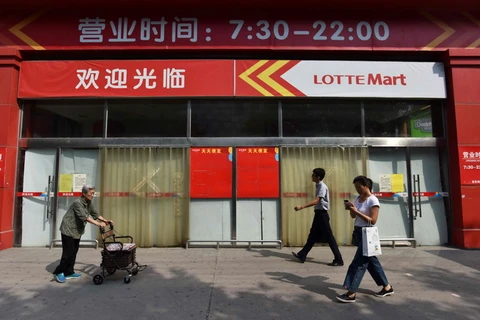 Một cửa hàng Lotte ở thủ đô Bắc Kinh đóng cửa ngày 15/9 vừa qua. (Ảnh: AFP/TTXVN)