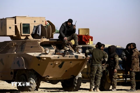 Lực lượng dân chủ Syria bắt đầu giai đoạn mới của chiến dịch tấn công thành phố Raqqa. (Ảnh: AFP/TTXVN)