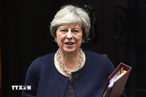 Thủ tướng Anh Theresa May sau cuộc họp ở London ngày 18/10. (Ảnh: AFP/TTXVN)