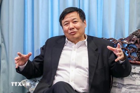 Thứ trưởng Tài chính Trung Quốc Chu Quang Diệu. (Ảnh: THX/TTXVN)
