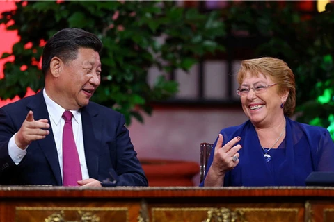 Chủ tịch Trung Quốc Tập Cận Bình và Tổng thống Chile Michelle Bachelet. (Nguồn: chinadaily) 
