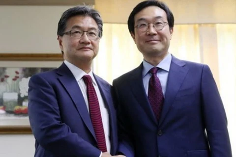 Đặc phái viên về vấn đề hạt nhân của Hàn Quốc Lee Do-hoon và người đồng cấp Mỹ Joseph Yun. (Nguồn: Yonhap)