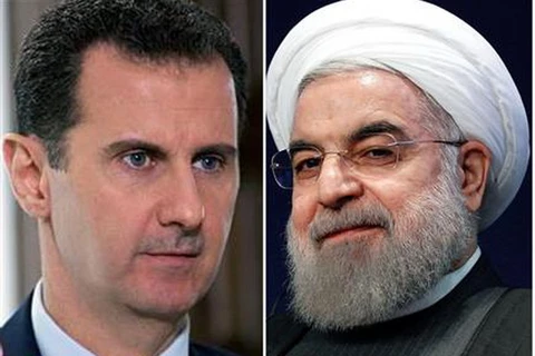 Tổng thống Iran Hassan Rouhani và người đồng cấp Syria Bashar al-Assad. (Nguồn: presstv)