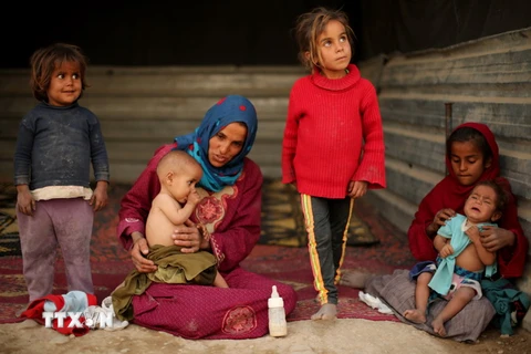 Người dân Syria tại một trại tị nạn ở Đông Ghouta. (Ảnh: AFP/TTXVN)