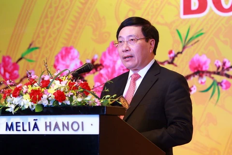 Phó Thủ tướng, Bộ trưởng Bộ Ngoại giao Phạm Bình Minh phát biểu tại buổi gặp mặt. (Ảnh: An Đăng/TTXVN)