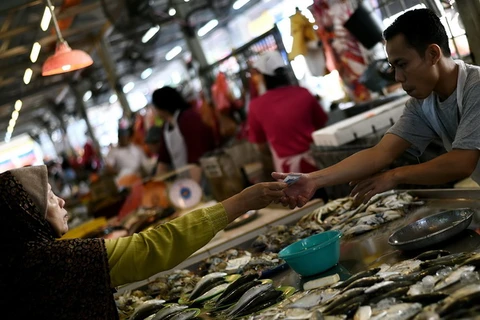 Một chợ cá ở Kuala Lumpur. (Ảnh: AFP/TTXVN)