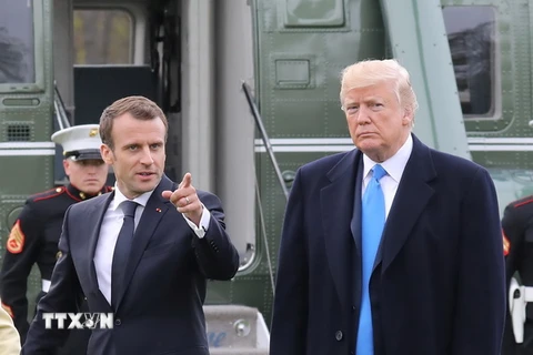 Tổng thống Mỹ Donald Trump (phải) và người đồng cấp Pháp Emmanuel Macron tại Washington, DC ngày 23/4. (Ảnh: AFP/TXTVN)