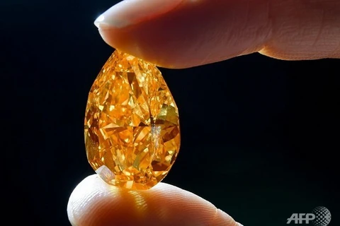Viên kim cương "The Orange" hình quả lê nặng 14,82 carat. (Nguồn: AFP)