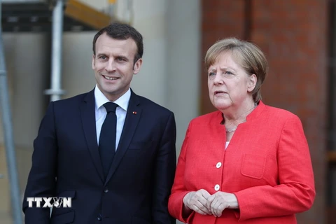 Tổng thống Pháp Emmanuel Macron (trái) và Thủ tướng Đức Angela Merkel. (Ảnh: THX/TTXTVN)