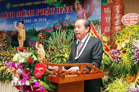Phó Thủ tướng Thường trực Chính phủ Trương Hòa Bình phát biểu chúc mừng Đại lễ Phật đản 2018. (Ảnh: Nguyễn Dân/TTXVN)