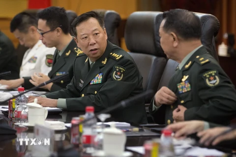 Ông Lý Tác Thành (giữa) tại một cuộc họp ở Bắc Kinh thuộc Trung Quốc. (Ảnh: AFP/TTXVN)