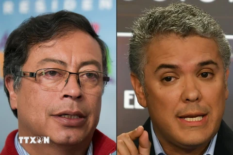 Ứng cử viên theo đường lối bảo thủ Ivan Duque và ứng cử viên cánh tả Gustavo Petro. (Ảnh: AFP/TTXVN)