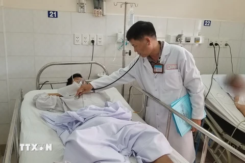 Anh Lê Xuân T., 33 tuổi, ngụ huyện Hóc Môn, điều trị tại bệnh viện Thống Nhất thành phố Hồ Chí Minh. (Ảnh: Đinh Hằng/TTXVN)