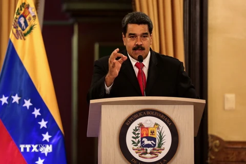 Tổng thống Venezuela phát biểu trên truyền hình sau vụ ám sát nhằm vào ông ở Caracas ngày 5/8. (Ảnh: THX/TTXVN)