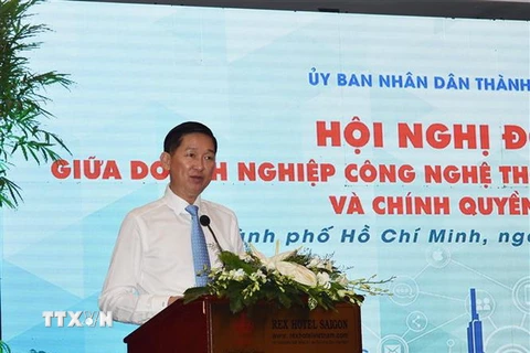 Phó Chủ tịch UBND Thành phố Hồ Chí Minh Trần Vĩnh Tuyến phát biểu tại hội nghị. (Ảnh: Xuân Anh/TTXVN)