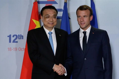 Thủ tướng Trung Quốc Lý Khắc Cường và Tổng thống Pháp Emmanuel Macron. (Nguồn: AFP)