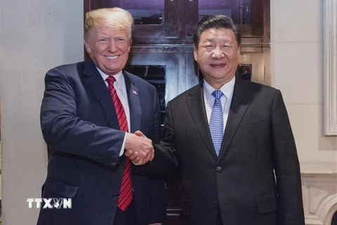 Tổng thống Mỹ Donald Trump (trái) và Chủ tịch Trung Quốc Tập Cận Bình. (Ảnh: THX/TTXVN)