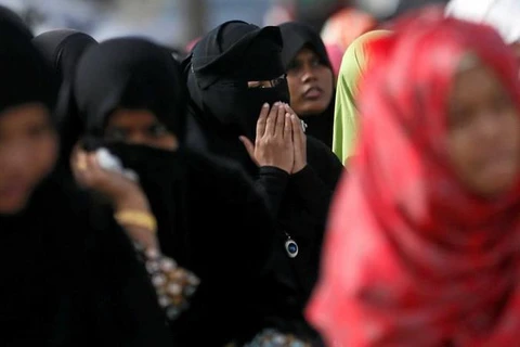 Phụ nữ Hồi giáo tham dự lễ cầu nguyện. (Nguồn: Reuters)