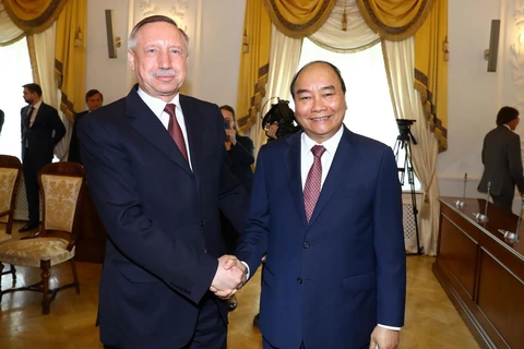 Thủ tướng Nguyễn Xuân Phúc gặp Quyền Thống đốc Saint Petersburg Beglov A.D. (Ảnh: Thống Nhất/TTXVN)