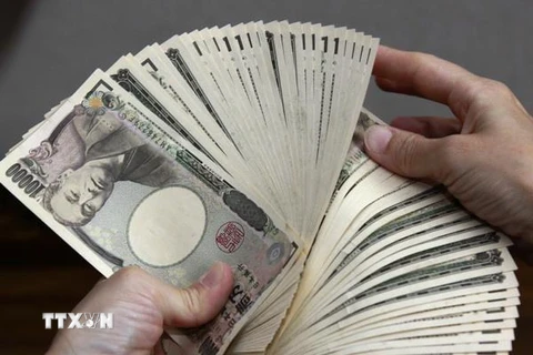 Đồng yen của Nhật Bản tại một ngân hàng ở Tokyo. (Ảnh: AFP/TTXVN)