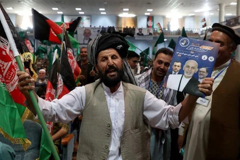Những người ủng hộ Tổng thống Afghanistan Ashraf Ghani tại cuộc bầu cử ở Kabul. (Nguồn: Reuters)