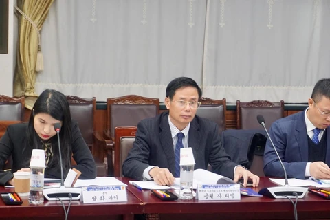 Ông Nguyễn Gia Liêm, Phó cục trưởng Cục Quản lý lao động ngoài nước phát biểu tại Hội thảo. (Ảnh: Trần Đình Phương/Vietnam+)