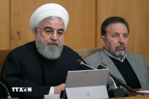 Tổng thống Iran Hassan Rouhani - bên trái. (Ảnh: AFP/TTXVN)