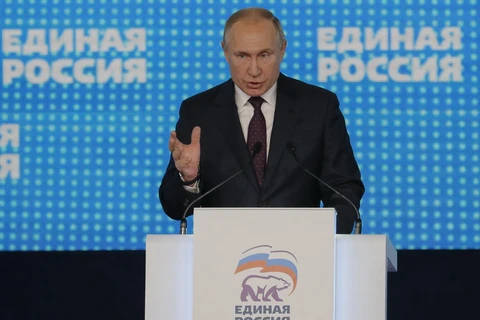 Tổng thống Nga Vladimir Putin phát biểu tại Đại hội lần thứ 19 của đảng Nước Nga thống nhất ở Moskva ngày 23/11. (Ảnh: AFP/TTXVN)
