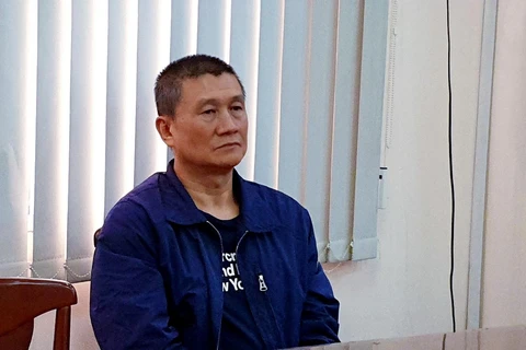 Đối tượng người Đài Loan trốn nã bị Bộ Công an Việt Nam bắt giữ. (Ảnh: Thành Chung/TTXVN)