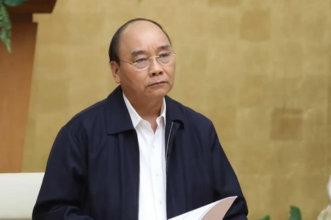 Thủ tướng Nguyễn Xuân Phúc chủ trì họp Thường trực Chính phủ với Ban Chỉ đạo Quốc gia phòng, chống dịch COVID-19. (Ảnh: Thống Nhất/TTXVN)