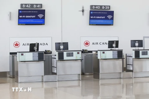 Khu vực làm thủ tục tại sân bay quốc tế Pearson ở Toronto, Canada vắng bóng hành khách do dịch COVID-19 ngày 21/3 vừa qua. (Ảnh: THX/TTXVN)