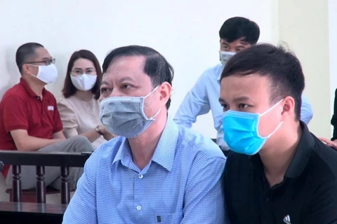 Bị cáo Nguyễn Chí Phương (nguyên Trưởng công an thành phố Thanh Hóa) bị truy tố về tội nhận hối. (Ảnh: Nguyễn Nam/TTXVN)