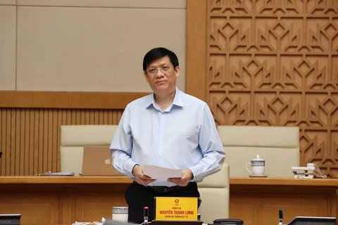 Quyền Bộ trưởng Bộ Y tế Nguyễn Thanh Long là một trong những thành viên của Ban Chỉ đạo Quốc gia phòng, chống dịch COVID-19. (Ảnh: Thống Nhất/TTXVN)